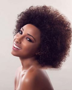 Natural curly hair concept of a young African American woman